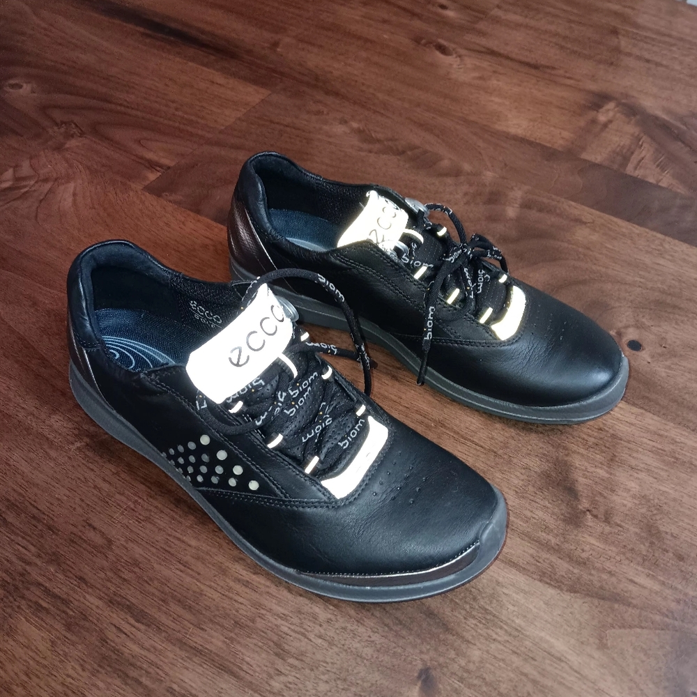 A pair of Ecco golf shoes